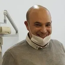 Dt. Ahmet Çobanoğlu — Diş Hekimi. Portre fotoğrafı.