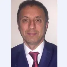 Doç. Dr. Mustafa Özat — Kadın Hastalıkları Ve Doğum, Ankara. Portre fotoğrafı.