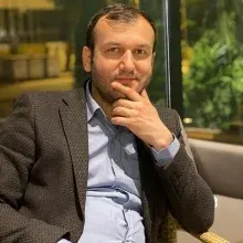 Doç. Dr. Ercan Baş — Üroloji, Isparta. Portre fotoğrafı.