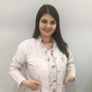 Uzm. Dt. Elmas Tüfek Atıcı — Çocuk Diş Hekimliği (Pedodonti), Eskişehir. Portre fotoğrafı.