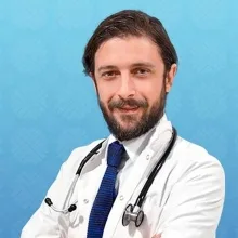 Dr. Öğr. Üyesi Erhan Gönen — Kardiyoloji, Pendik, İstanbul. Portre fotoğrafı.