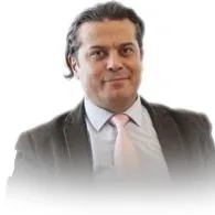 Doç. Dr. Osman Abalı — Çocuk ve Ergen Psikiyatrisi, İstanbul. Portre fotoğrafı.