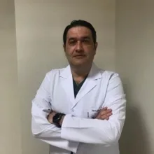 Uzm. Dr. Sefer Tolga Okay — Çocuk Cerrahisi, Yıldırım, Bursa. Portre fotoğrafı.