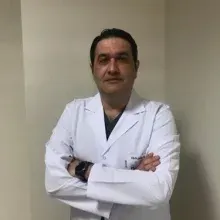 Uzm. Dr. Sefer Tolga Okay — Çocuk Cerrahisi, Yıldırım, Bursa. Portre fotoğrafı.