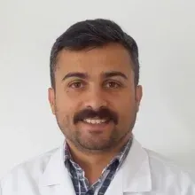 Dt. Burak Balçık — Diş Hekimi. Portre fotoğrafı.