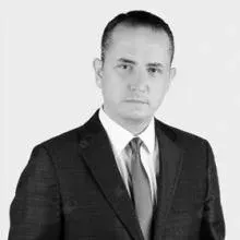 Doç. Dr. Sabri Cemil İşler — Ağız Diş Ve Çene Cerrahisi, İstanbul. Portre fotoğrafı.