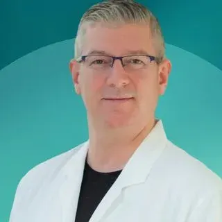 Op. Dr. Ertan Ergün — Beyin Ve Sinir Cerrahisi, Yenimahalle, Ankara. Portre fotoğrafı.