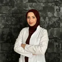 Dkt. Büşra Onural — Dil ve Konuşma Terapisi. Portre fotoğrafı.