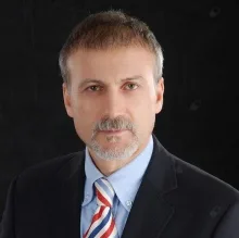Prof. Dr. Fuat Demirci — Kadın Hastalıkları Ve Doğum, İstanbul. Portre fotoğrafı.