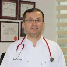Uzm. Dr. Hasan Güven — Adana. Portre fotoğrafı.