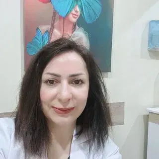 Doç. Dr. Hülya Aladağ — Kadın Hastalıkları Ve Doğum, İstanbul. Portre fotoğrafı.