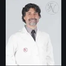 Op. Dr. Aykan Özçelik — Kadın Hastalıkları Ve Doğum, İstanbul. Portre fotoğrafı.