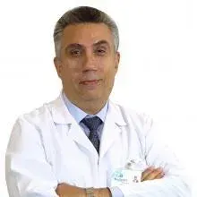 Prof. Dr. Noyan Temuçin Oğuş — Kalp Ve Damar Cerrahisi. Portre fotoğrafı.