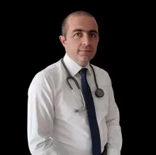 Uzm. Dr. Baki Doğan — Gaziantep. Portre fotoğrafı.
