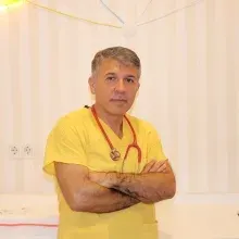 Doç. Dr. Yavuz Tokgöz — Ankara. Portre fotoğrafı.