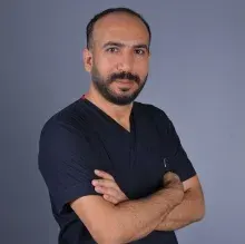 Op. Dr. Bahri Güzel — Genel Cerrahi, Yüreğir, Adana. Portre fotoğrafı.