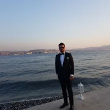 Doç. Dr. Ufuk Atlıhan — Kadın Hastalıkları Ve Doğum, İzmir. Portre fotoğrafı.