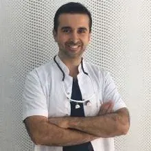 Dr. Öğr. Üyesi Bertan Kesim — Kayseri. Portre fotoğrafı.