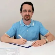 Doç. Dr. Dursun Karaman — Çocuk ve Ergen Psikiyatrisi, Ankara. Portre fotoğrafı.