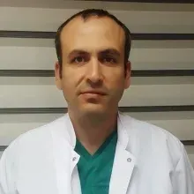 Op. Dr. Ertuğrul Karğı — Genel Cerrahi. Portre fotoğrafı.