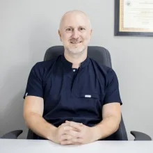 Prof. Dr. A. Alper Öz — Ortodonti, Samsun. Portre fotoğrafı.