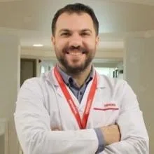 Doç. Dr. Zülfü Sertkaya — Üroloji, İstanbul. Portre fotoğrafı.