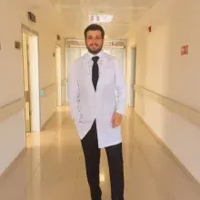 Op. Dr. Tolga Akbıyık — Beyin Ve Sinir Cerrahisi. Portre fotoğrafı.