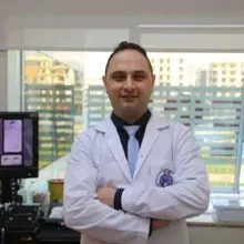 Op. Dr. Süreyya Hikmet Kozcu — Kulak Burun Boğaz, Muğla. Portre fotoğrafı.