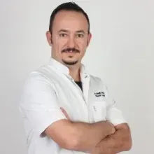 Op. Dr. Malik Abacı — Plastik Rekonstrüktif Ve Estetik Cerrahi, İstanbul. Portre fotoğrafı.