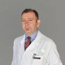 Prof. Dr. Doğan Bek — Ortopedi Ve Travmatoloji, Ankara. Portre fotoğrafı.
