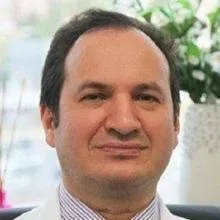 Prof. Dr. Turan Uslu — Fiziksel Tıp Ve Rehabilitasyon, İstanbul. Portre fotoğrafı.