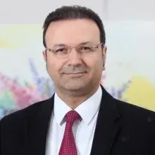 Prof. Dr. Saim Yılmaz — Radyoloji, Antalya. Portre fotoğrafı.