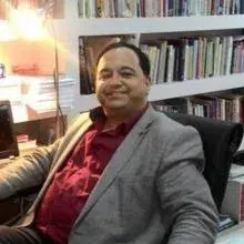 Uzm. Dr. Hüsnü Menteşeoğlu — Psikiyatri, Denizli. Portre fotoğrafı.