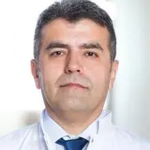 Prof. Dr. Bekir Durmuş — Fiziksel Tıp Ve Rehabilitasyon. Portre fotoğrafı.