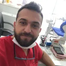 Dt. Hasan Mutlu — Diş Hekimi, Selçuklu, Konya. Portre fotoğrafı.
