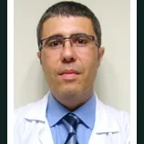 Uzm. Dr. İlhan Berberoğlu — Anesteziyoloji Ve Reanimasyon, Antalya. Portre fotoğrafı.