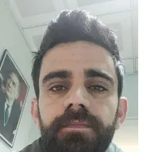 Dyt. Fahri Ertaş — Diyetisyen. Portre fotoğrafı.