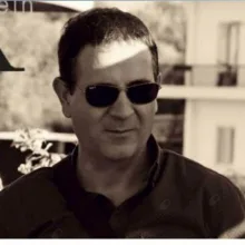 Uzm. Dr. Türker Erkcan — Çocuk Sağlığı Ve Hastalıkları. Portre fotoğrafı.