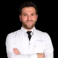 Uzm. Dr. Çağlar Karabaş — Fiziksel Tıp Ve Rehabilitasyon, Antalya. Portre fotoğrafı.