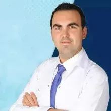 Uzm. Dr. Özgür Can Caner — Antalya. Portre fotoğrafı.