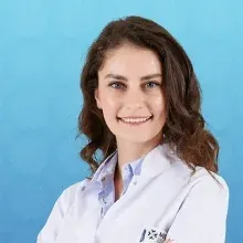 Dr. Öğr. Üyesi Nurcan Altaş — Periodontoloji, İstanbul. Portre fotoğrafı.