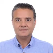 Doç. Dr. Mert Zeytinoğlu — Ağız Diş Ve Çene Cerrahisi, İzmir. Portre fotoğrafı.