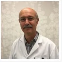 Uzm. Dr. Ali İhsan Doğru — Gastroenteroloji, İstanbul. Portre fotoğrafı.