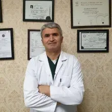 Uzm. Dr. Gürhan Günay — Antalya. Portre fotoğrafı.