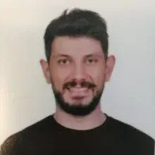 Dt. Ercan Ergün — Diş Hekimi, İstanbul. Portre fotoğrafı.