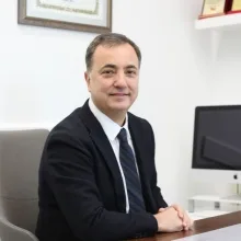Prof. Dr. Yıldırım Hakan Bağış — Restoratif Diş Tedavisi, Ankara. Portre fotoğrafı.