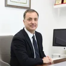Prof. Dr. Yıldırım Hakan Bağış — Restoratif Diş Tedavisi, Ankara. Portre fotoğrafı.