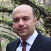 Uzm. Dr. Erkan Kuru — Psikiyatri, Ankara. Portre fotoğrafı.