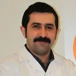 Dr. Erdal Uzun — Pratisyen, Çukurova, Adana. Portre fotoğrafı.