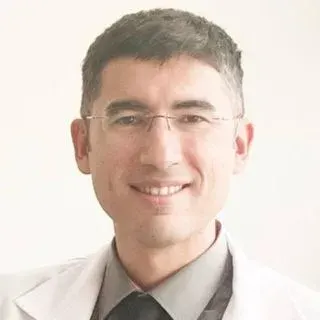 Doç. Dr. Volkan Doğru — Genel Cerrahi, Antalya. Portre fotoğrafı.